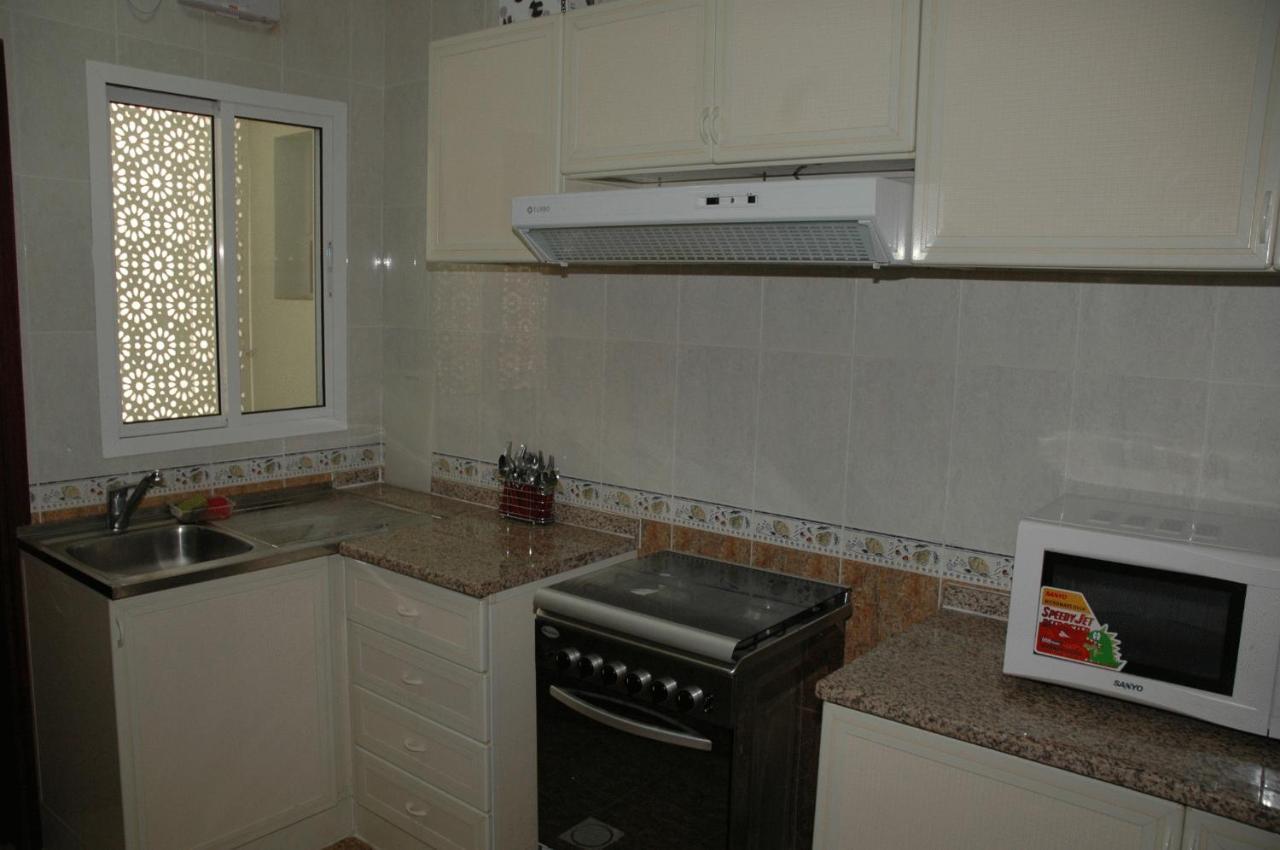 Sahara Hotel Apartments Маскат Стая снимка